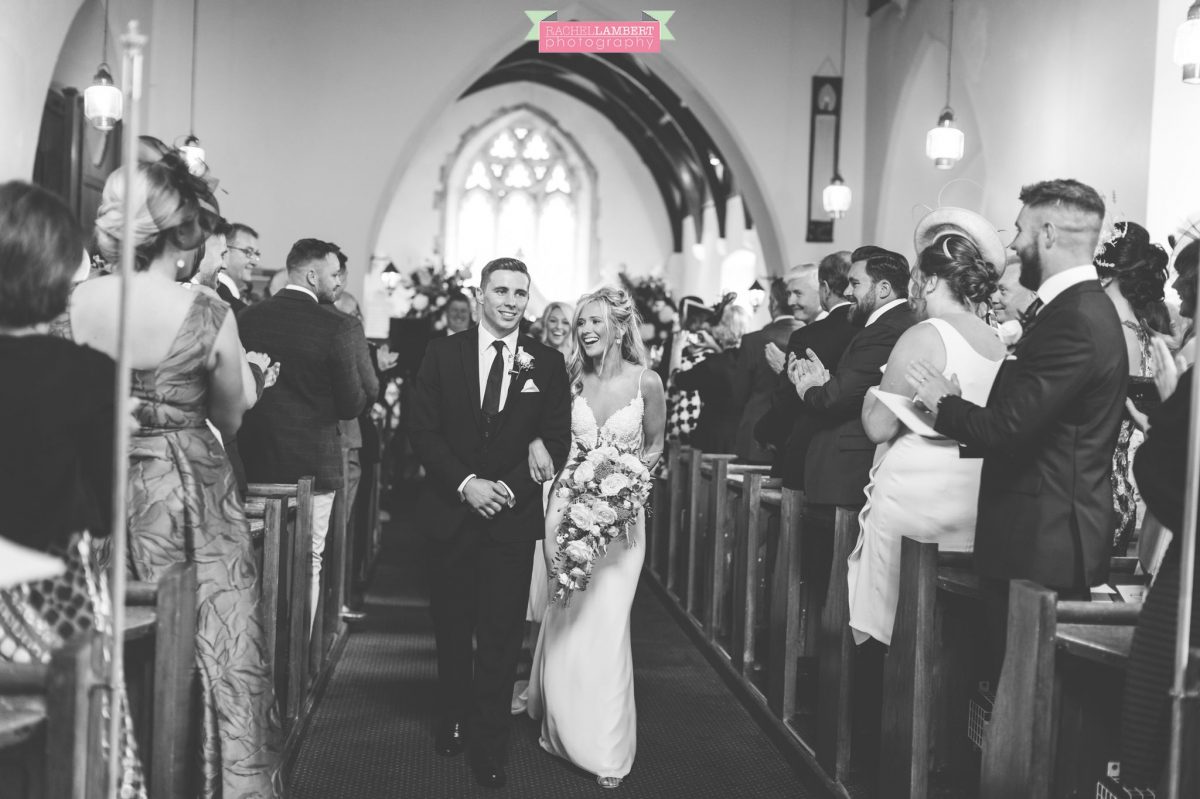 bride and groom exiting the church wedding