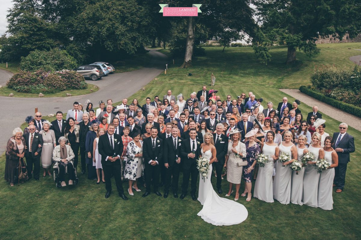 guests group shot with bride and groom the grove nartberth