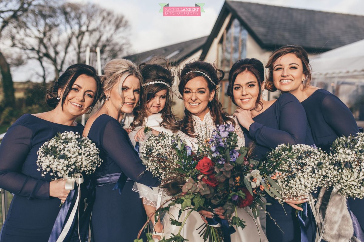 bride and bridesmaids in navy blue