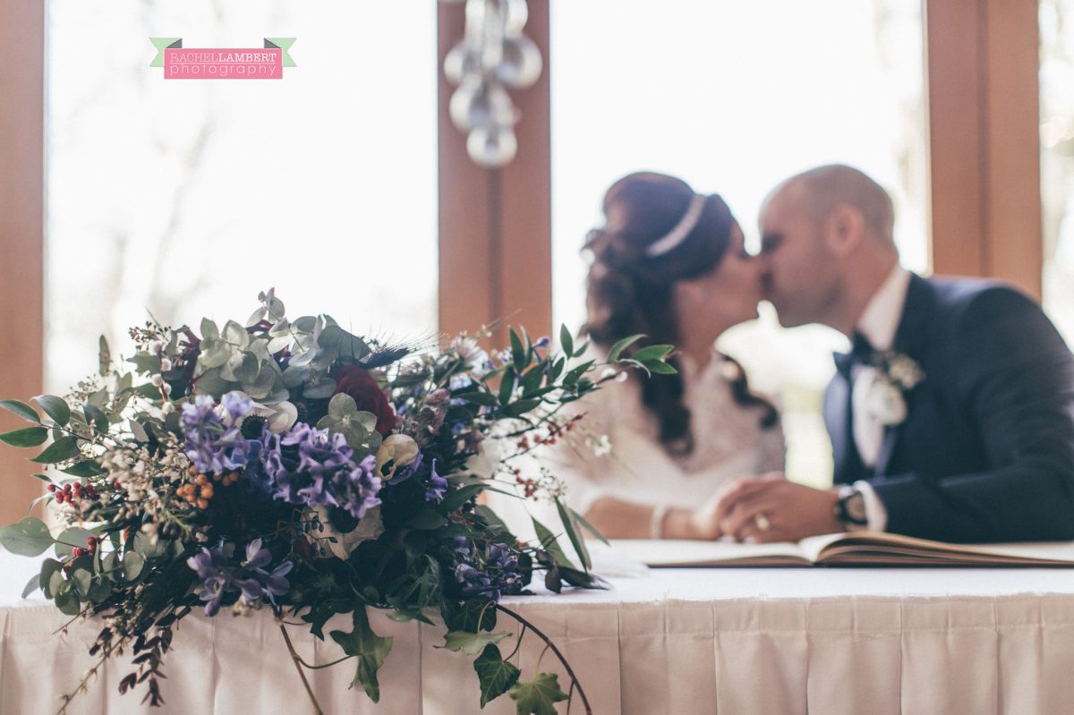 signing the register bride and groom