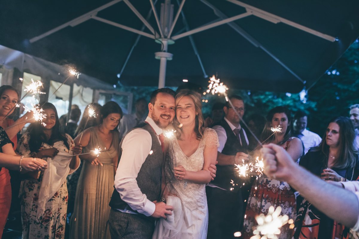 sparkler shot at pencoed house wedding venue bride and groom 