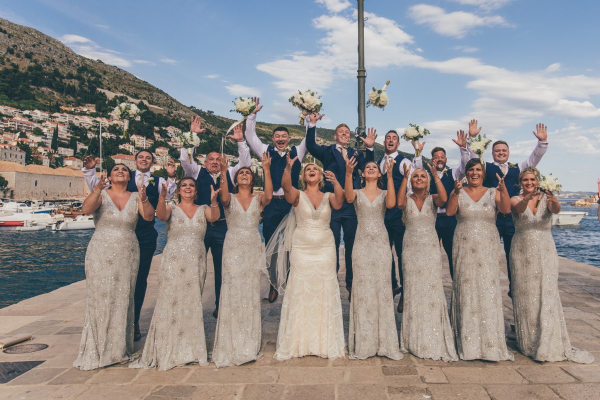 bridal party at the harbour in dubrovnik in croatia summer wedding destination rachel lambert photography