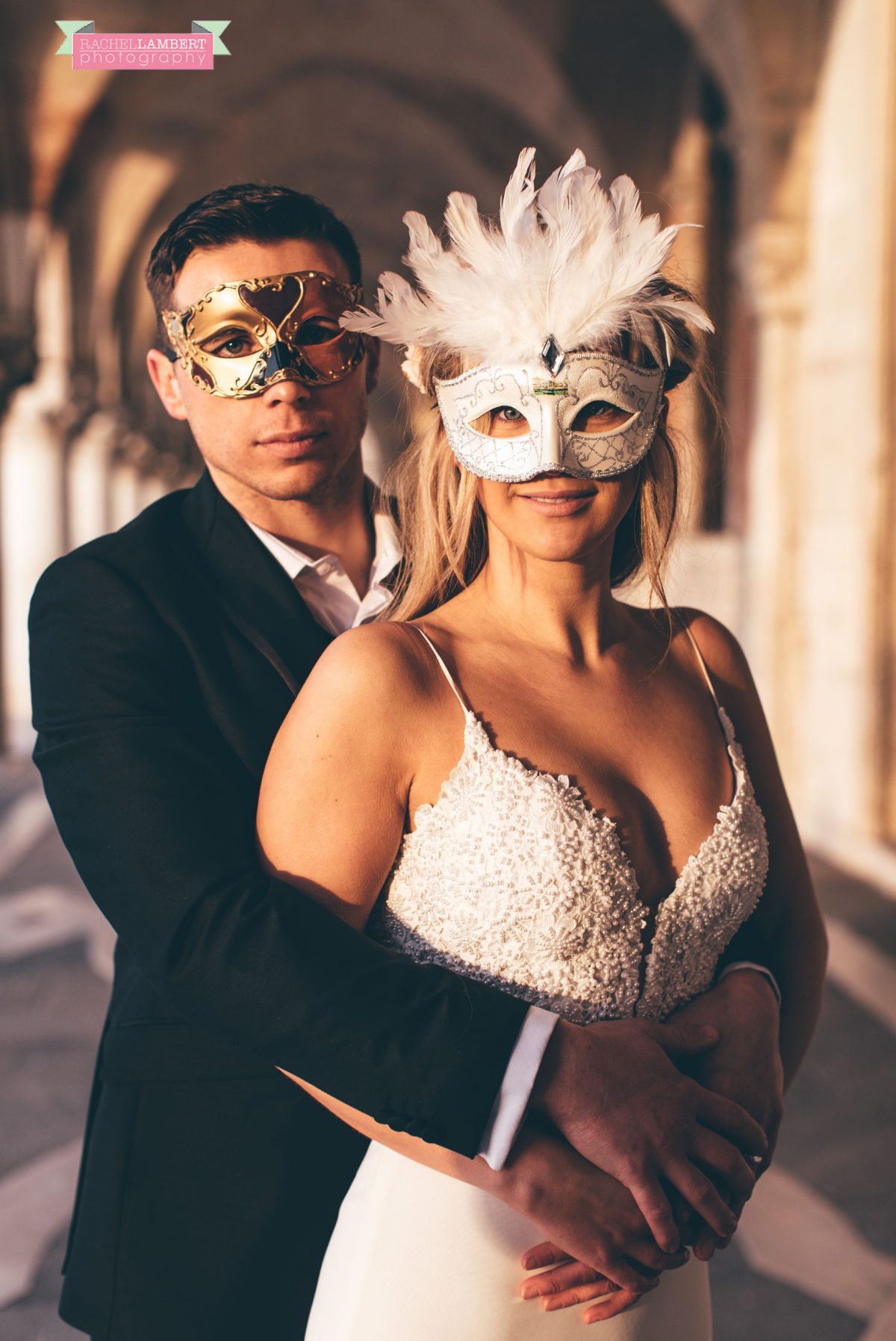 bride and groom sunrise carnival masks st marks square Venice italy