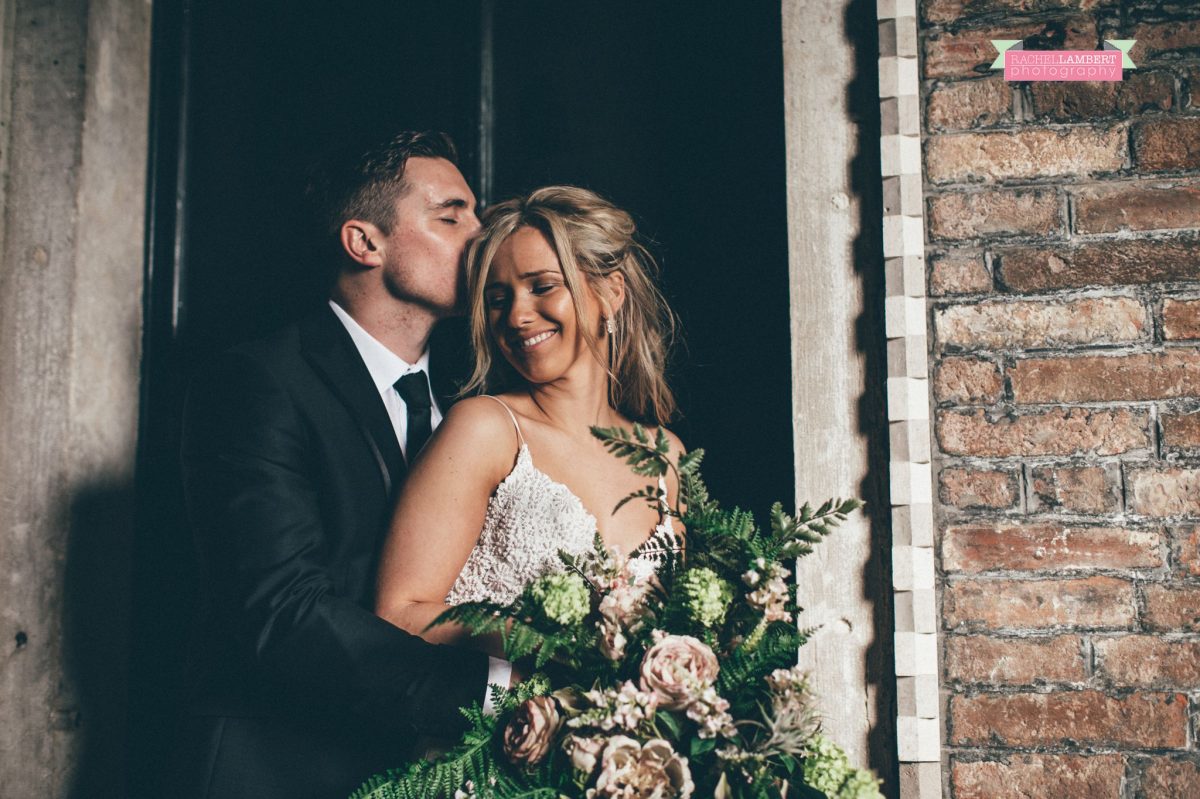 bride and groom with flowers Venice italy