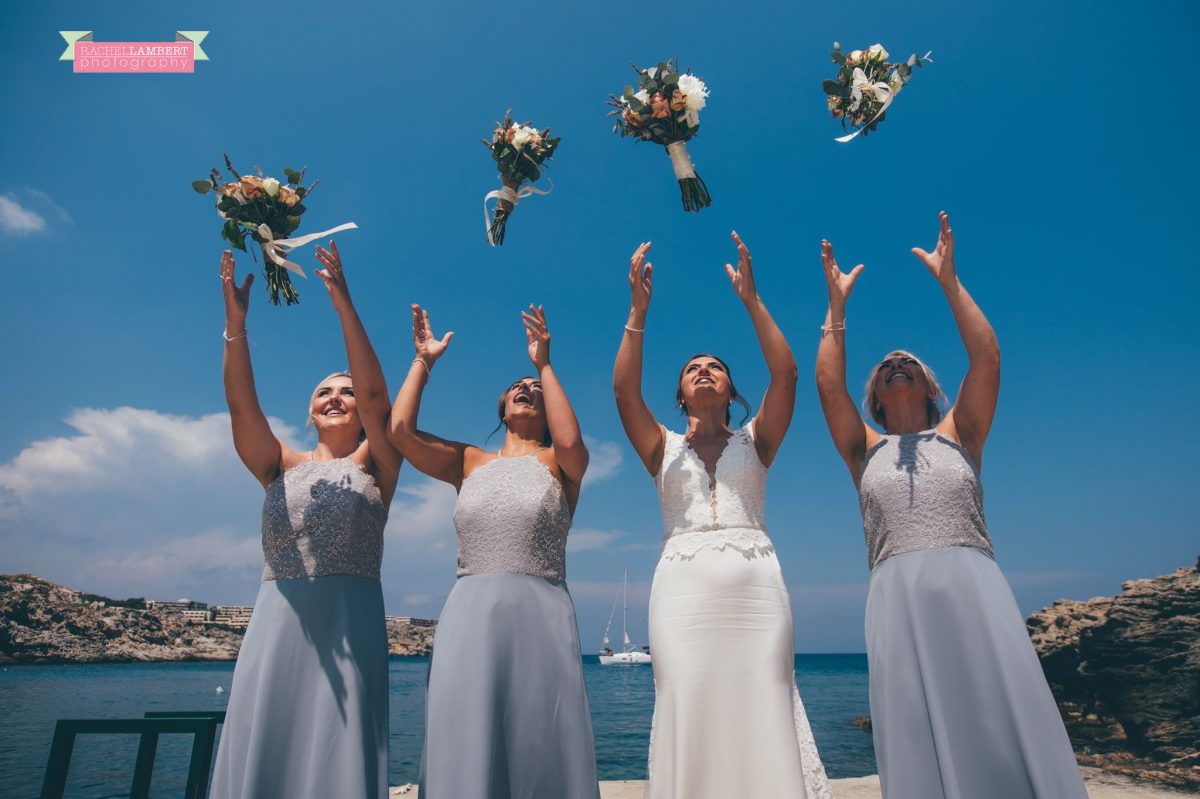 destination wedding greece kalithea springs rhodes kalithea springs bride and bridesmaids throwing boquet