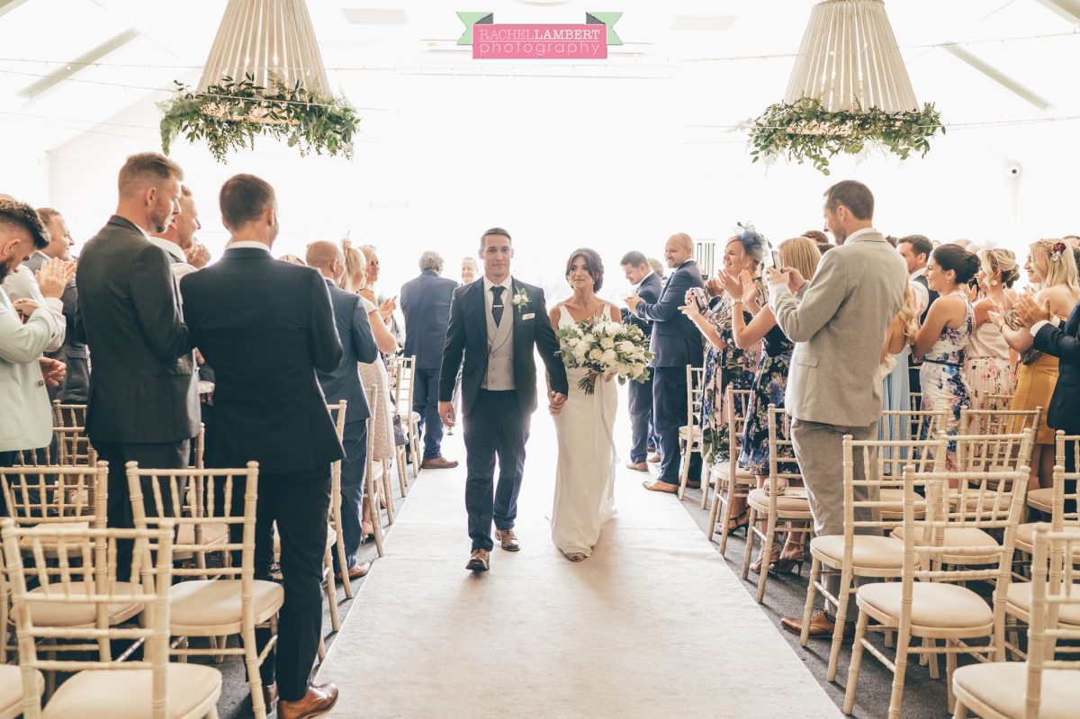 Rachel Lambert Photography llanerch vineyard wedding photographer bride and groom walking down the aisle