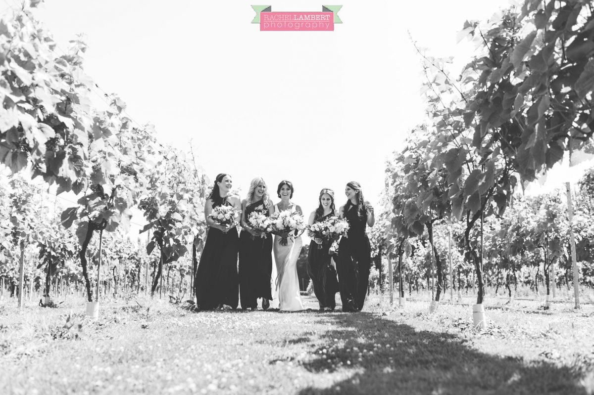 Rachel Lambert Photography llanerch vineyard wedding photographer bride with bridesmaids walking