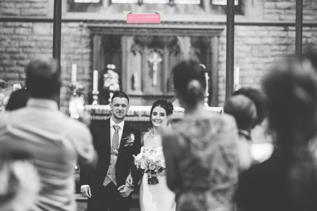 olwalls wedding photographer rachel lambert photography bride and groom in st peters church newton