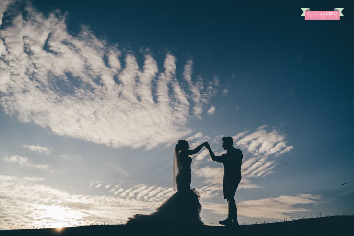 rachel lambert photography post wedding shoot dunraven bay sony alpha bride and groom sunset silhouette