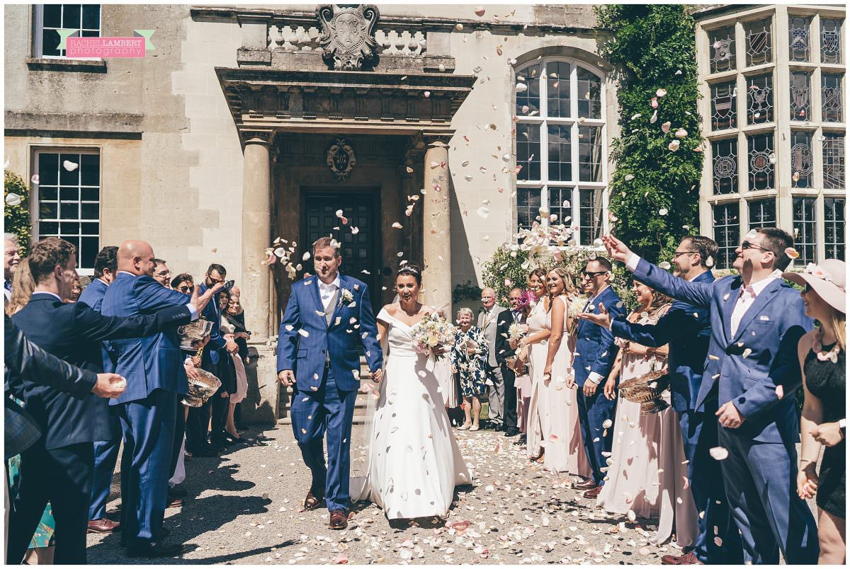elmore court wedding photographer bride and groom confetti shot
