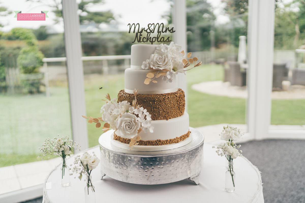 oldwalls wedding photographer bride and groom cake