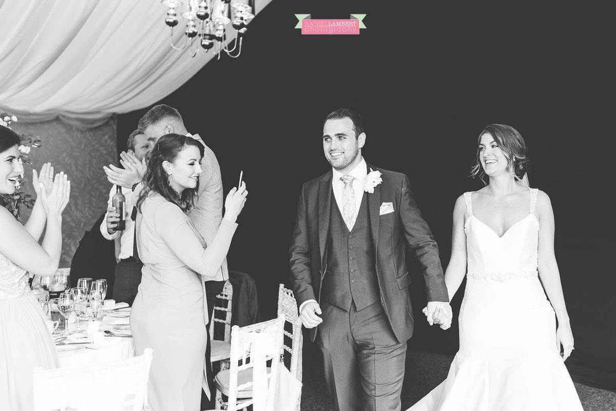 oldwalls wedding photographer bride and groom arrival into reception