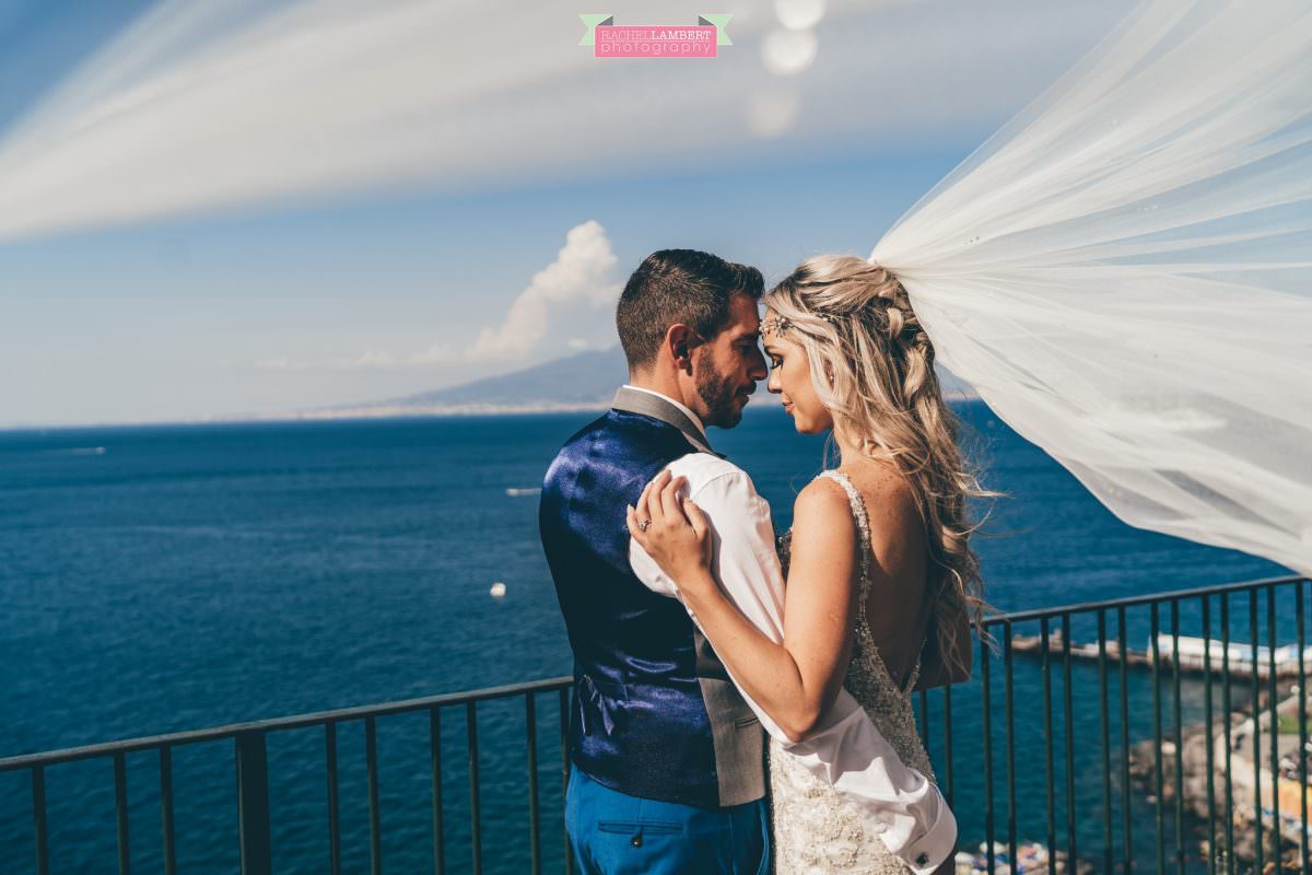 wedding photographer sorrento italy bride and groom chiostro di san francesco long veil laura may bridal