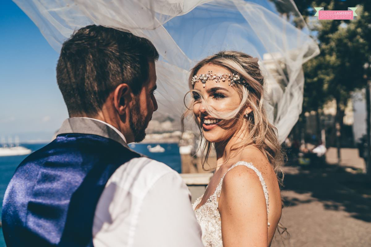 wedding photographer sorrento italy bride and groom chiostro di san francesco long veil 