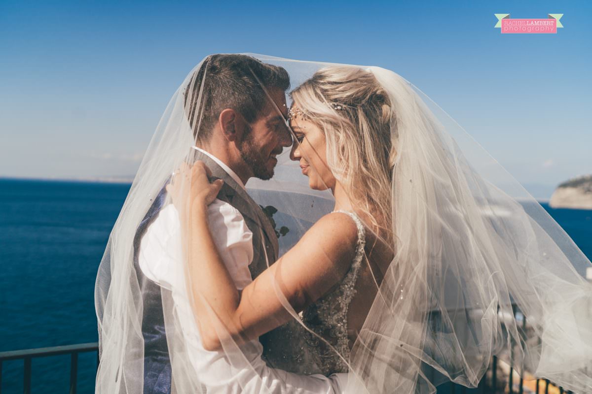 wedding photographer sorrento italy bride and groom chiostro di san francesco long veil 
