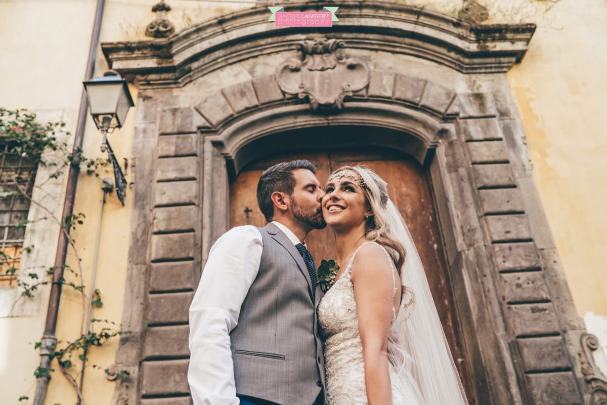 wedding photographer sorrento italy bride and groom italian door