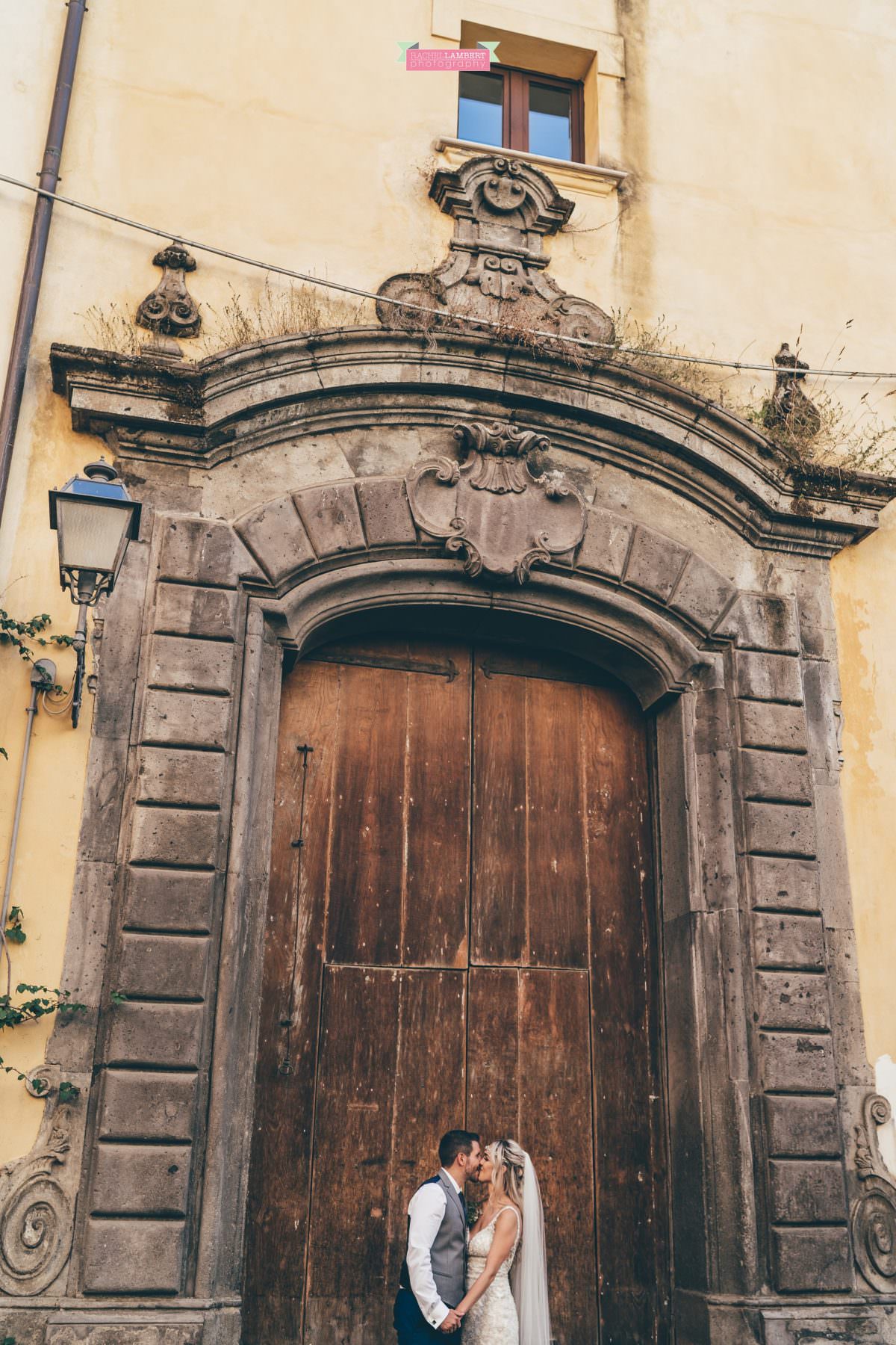 wedding photographer sorrento italy bride and groom door