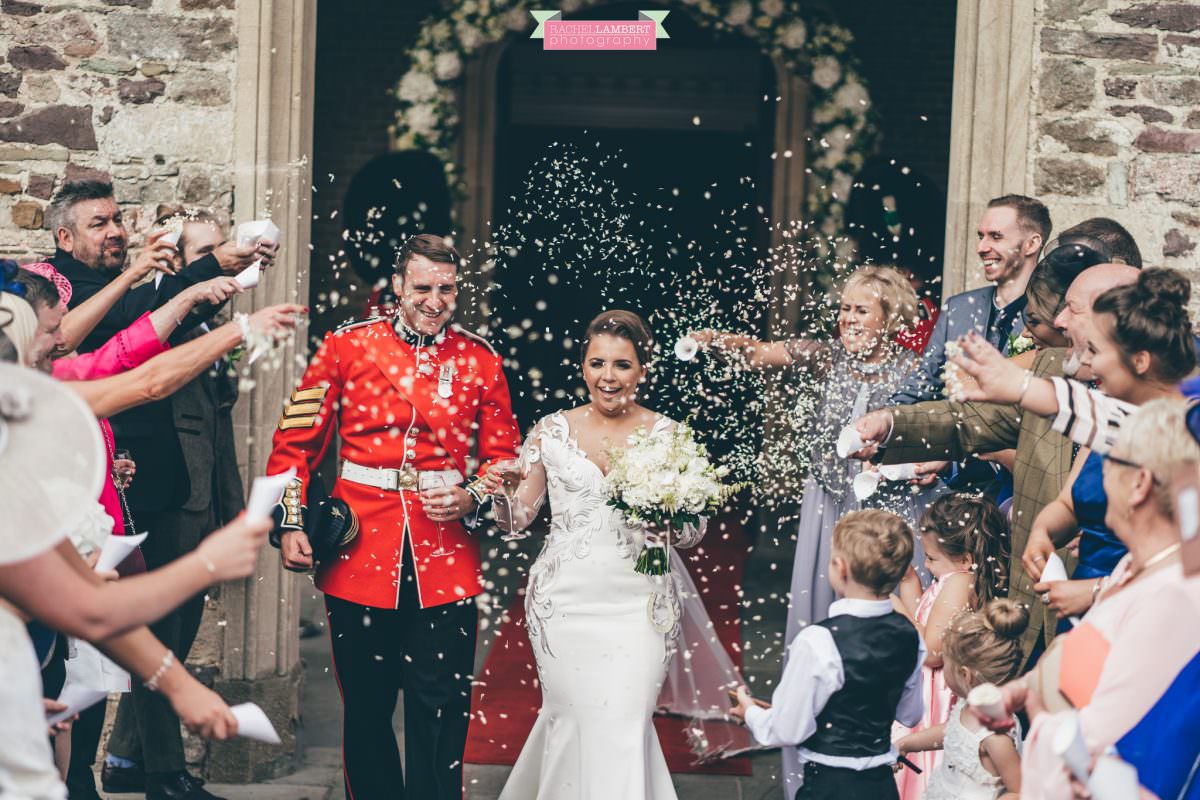 hensol castle wedding photographer bride and groom confetti