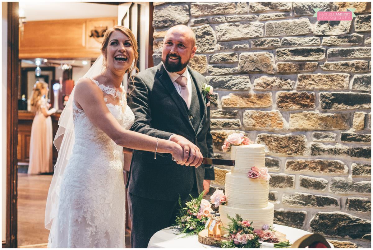 cardiff wedding photographer miskin manor rachel lambert photography cutting the cake