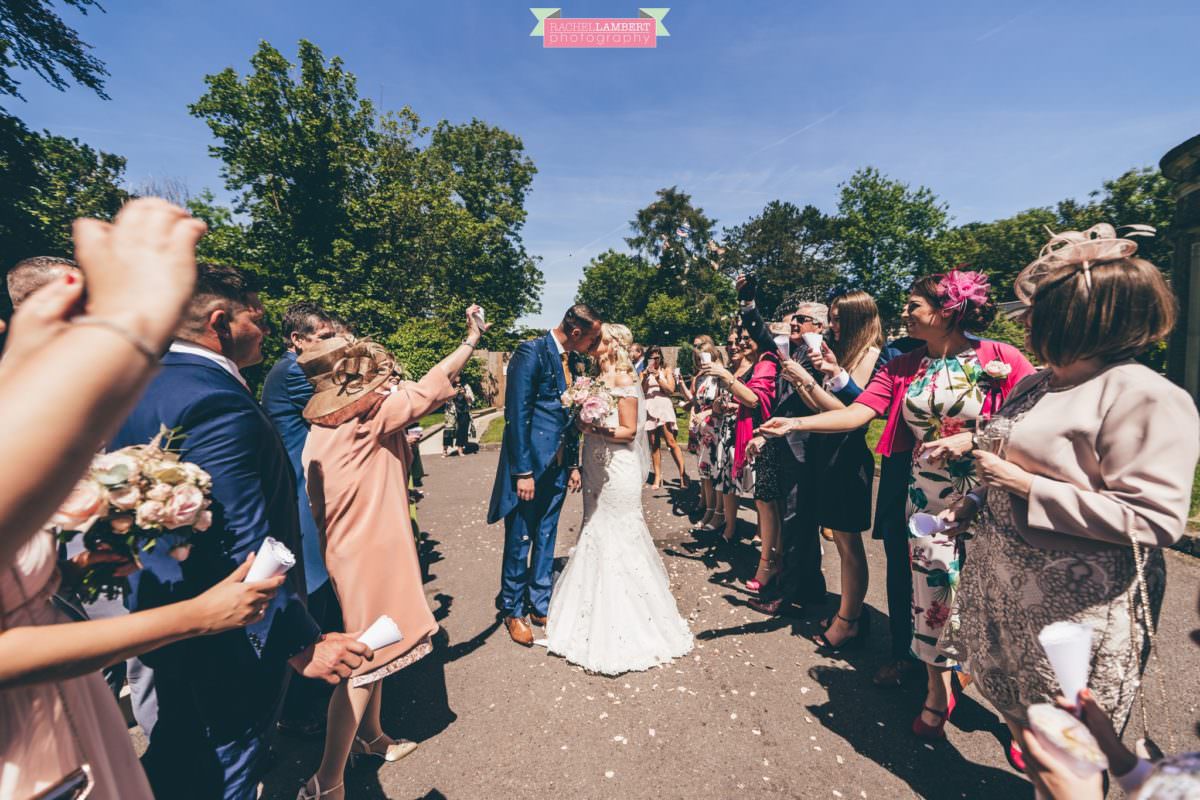 rachel lambert photography decourcey's manor wedding photographer bride and groom confetti