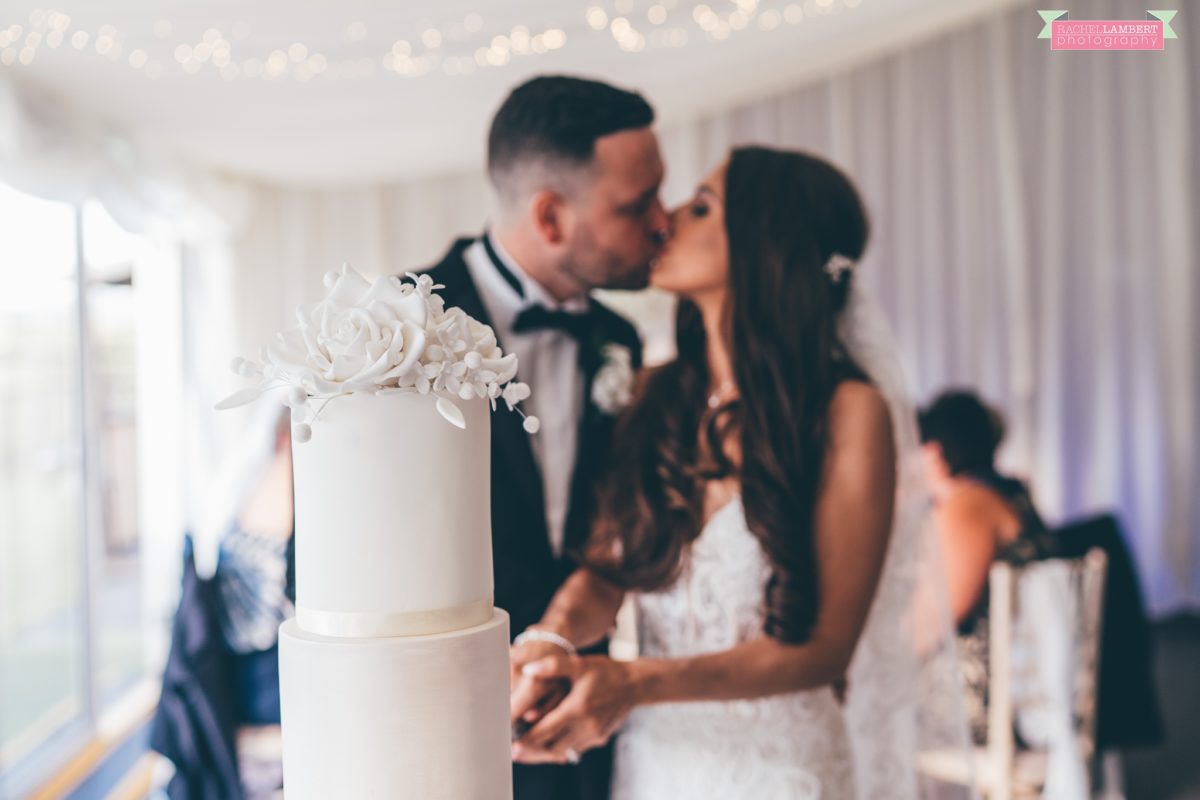 Cardiff Wedding Photographer Llanerch Vineyard rachel lambert photography cutting the cake