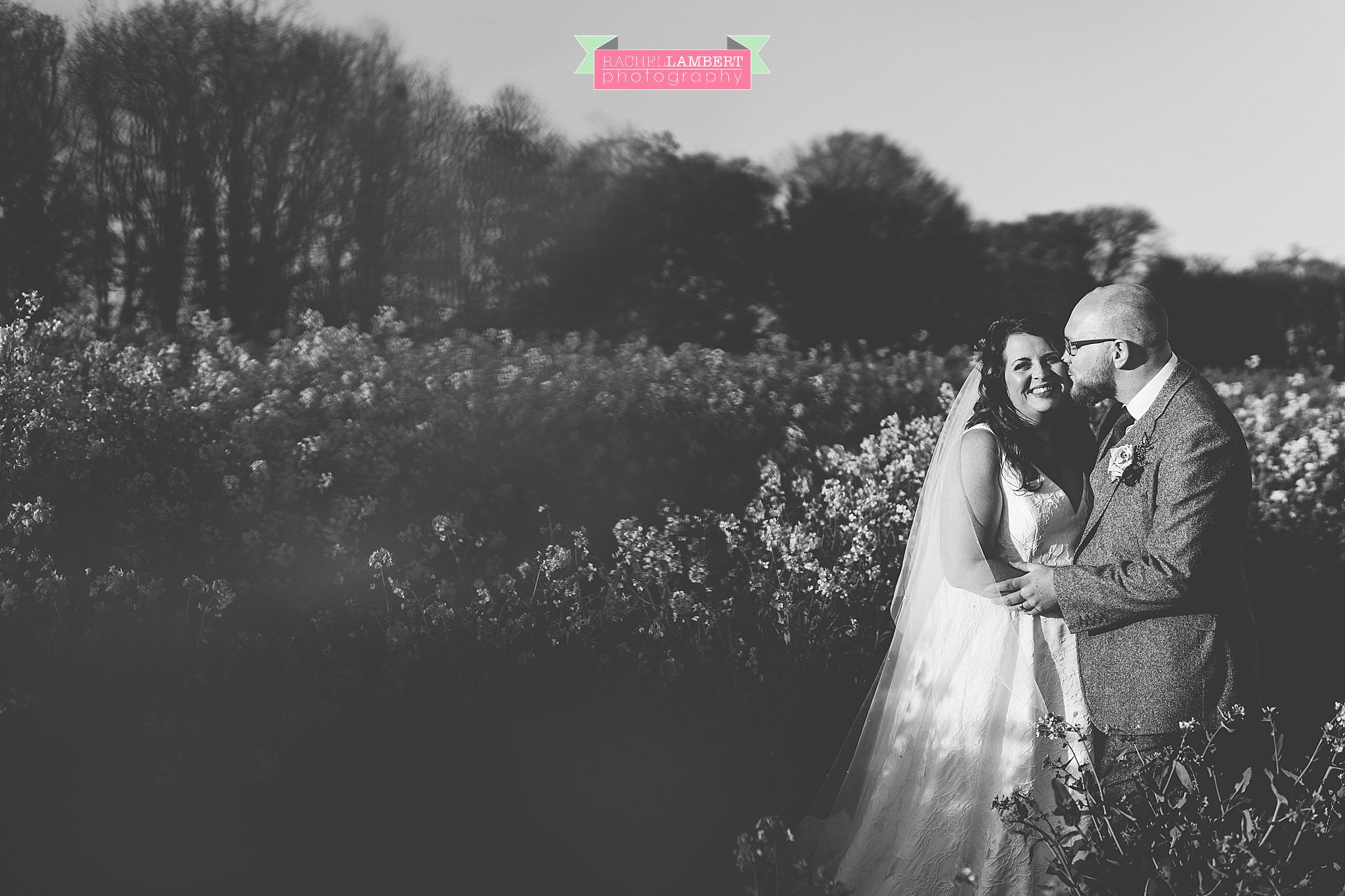 rosedew farm wedding bride and groom rapeseed field